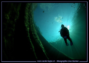 My wife diving the Verzasca River... :O)... by Michel Lonfat 